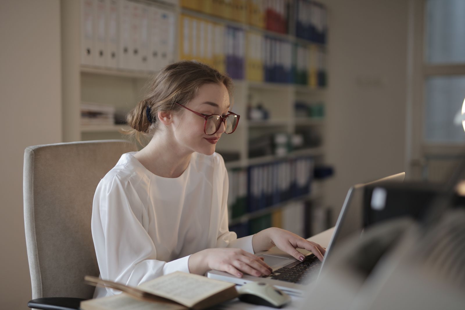 Case handler working at a desk
